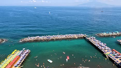 aerial view of beachgoers enjoying the sea