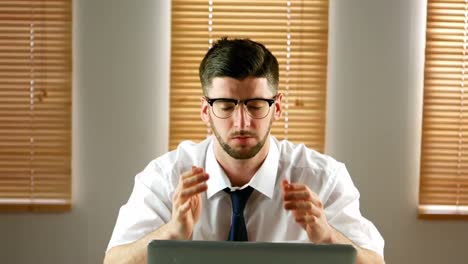 Businessman-working-on-laptop