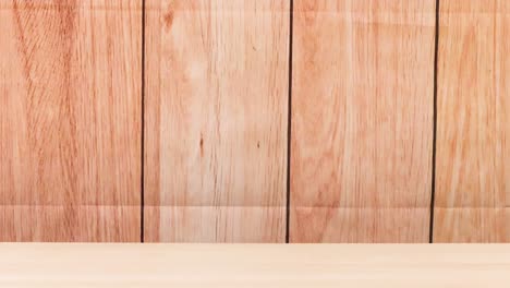 a soccer ball repeatedly bounces off a wooden wall, showcasing dynamic motion and impact.