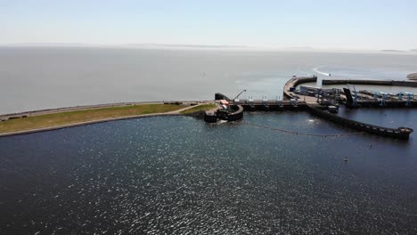 Aerial-Over-Seawall-Beside-Cardiff-Bay-Barrage