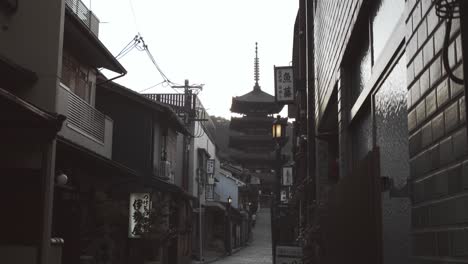 Slide-shot-of-a-big-temple-during-sunrise-in-Kyoto,-Japan-4K-slow-motion