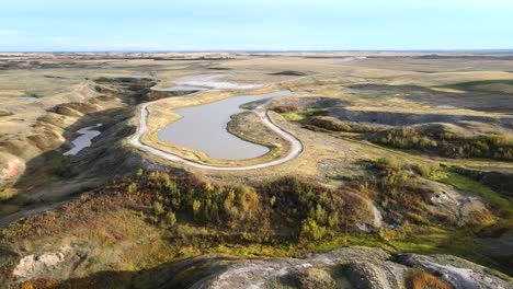 Scenic-4k-backwards-flight-over-badlands-of-Canada