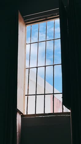 open window with barred view