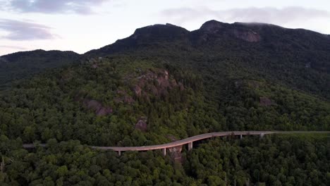 car drives along the blue ridge parkway viaduct aerial