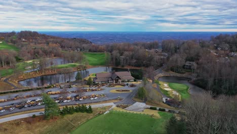 aerial view of the clubhouse at the cliffs at glassy mountain golf course, landrum, sc