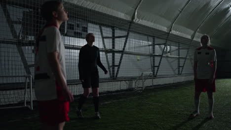 women's soccer team playing indoor