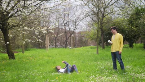 mother and daughter in a spring park