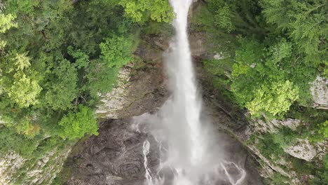 top-down aerial view of seerenbachfälle waterfall cascading into rocky terrain in switzerland