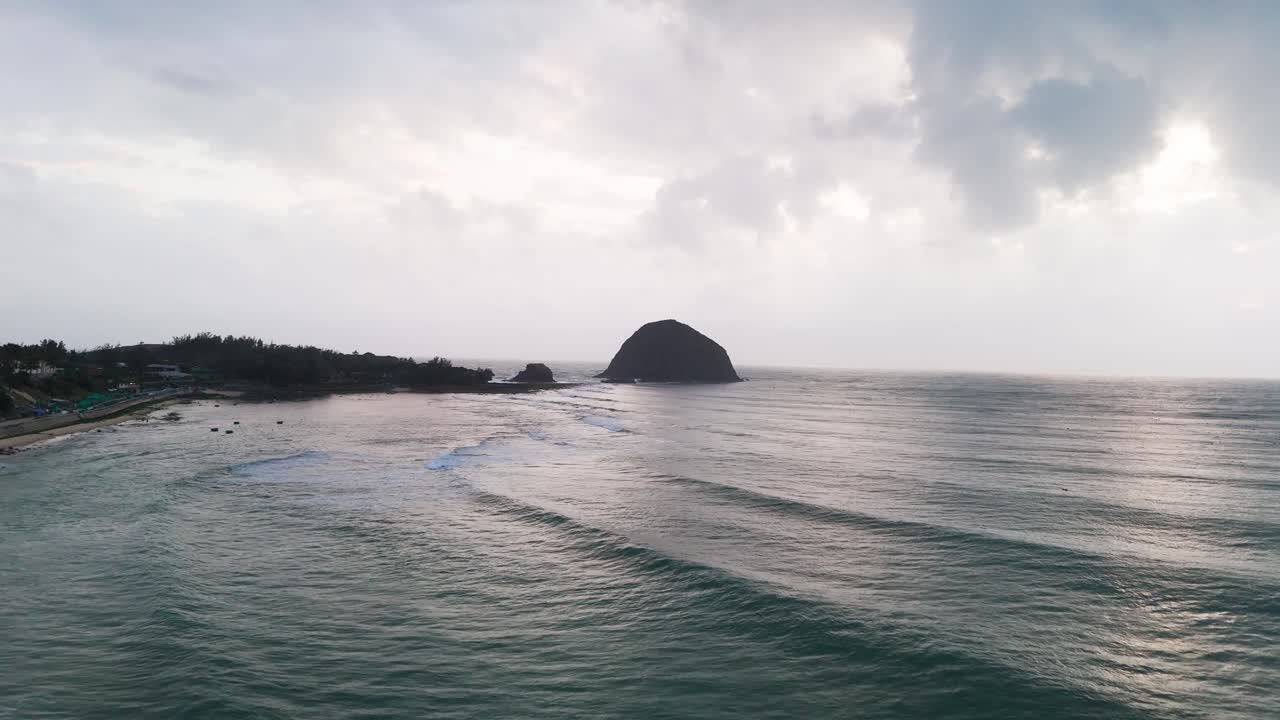 Aerial View Dolly of the Yen Beach and the Mountain at the Sea.