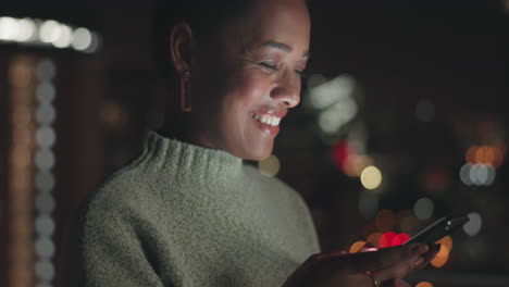 Black-woman,-phone-and-happy-typing-at-night