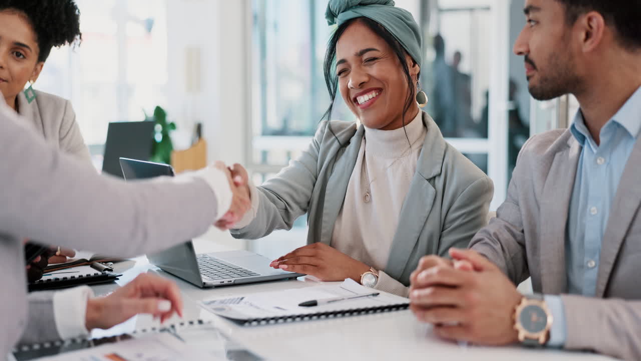 Handshake, teamwork and collaboration of business