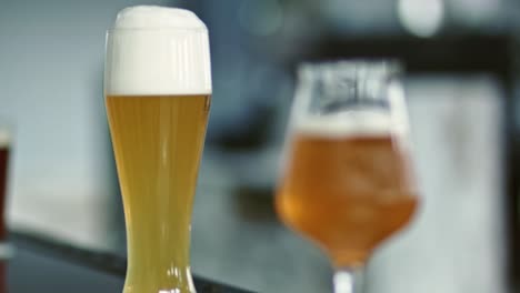 bartender serving glass of beer at party nightclub pub