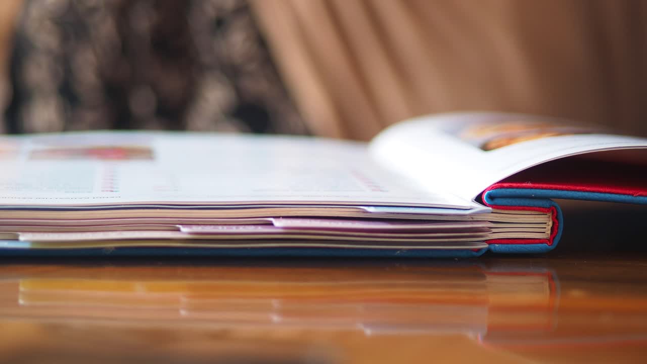 Open book or menu on a wooden table