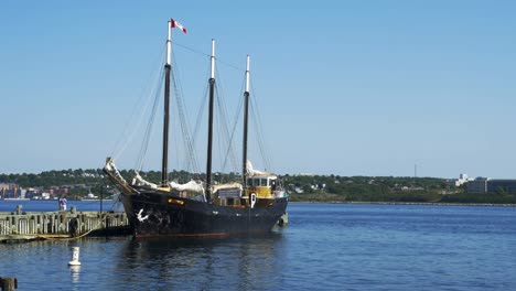 3-mast barque sailing vessel docked in halifax, nova scotia