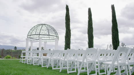 empty seats before the religious wedding ceremony in an outdoor location