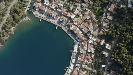 straight down aerial flyover of lagkada marina bay on chios in greece