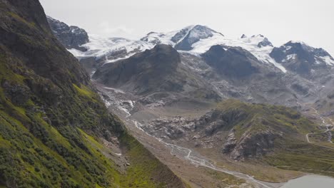 aerial drone flying over vast swiss switzerland mountains alps