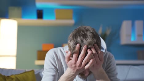 frustrated and worried young man crying.