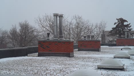 Snowfall-over-the-rooftop-of-the-appartment-building