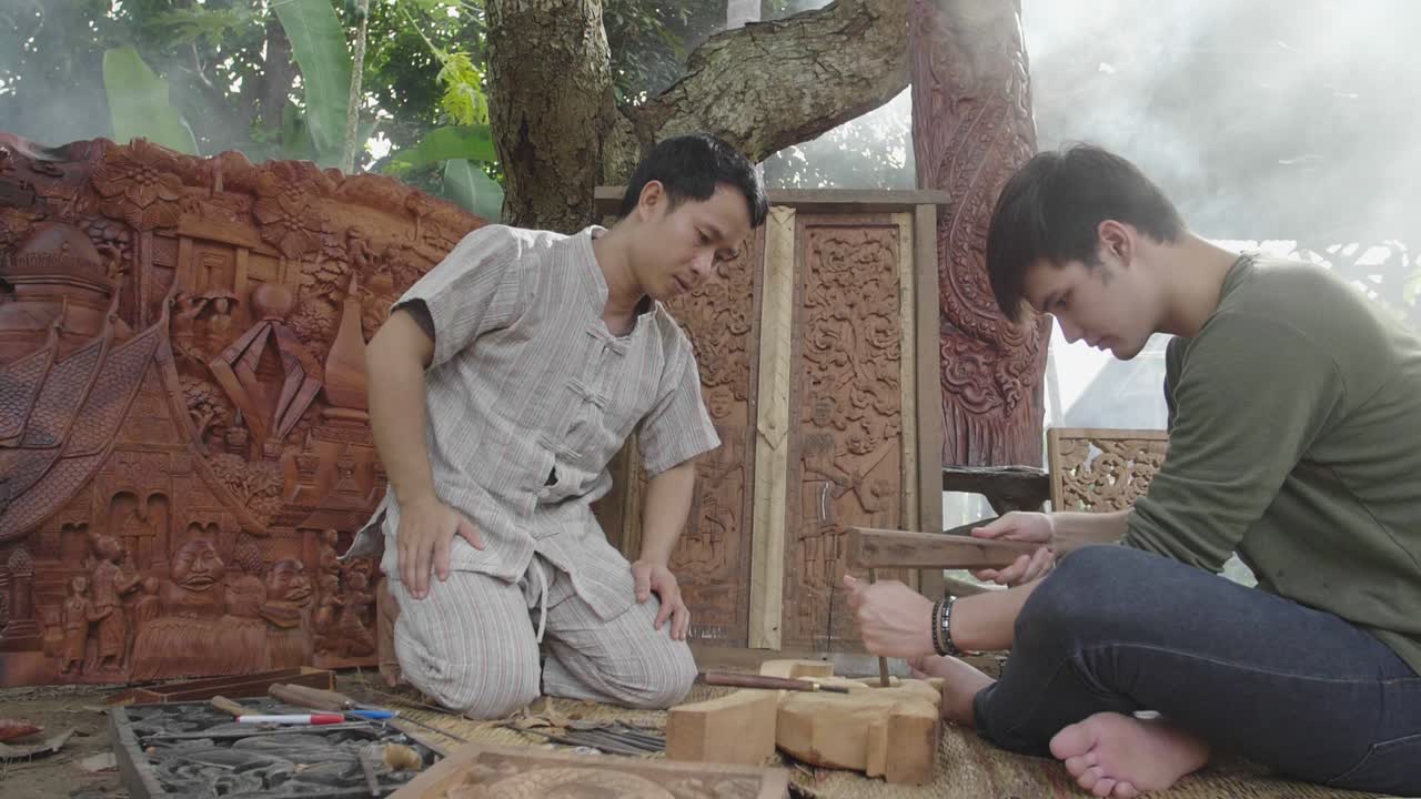 Young Man Learning To Carve Wooden To His Teacher, Slow Motion