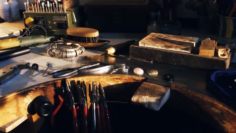 Goldsmith-work-tools-on-workbench