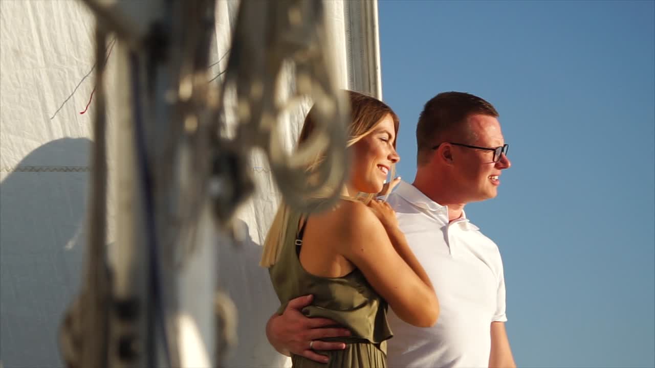 Couple on a sailboat