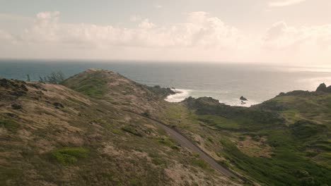 A-haunting-aerial-floating-out-to-the-sea-near-Honokohau-Bay-in-Maui,-Hawaii