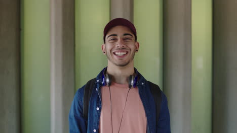 attractive young hispanic man student portrait of handsome man smiling happy