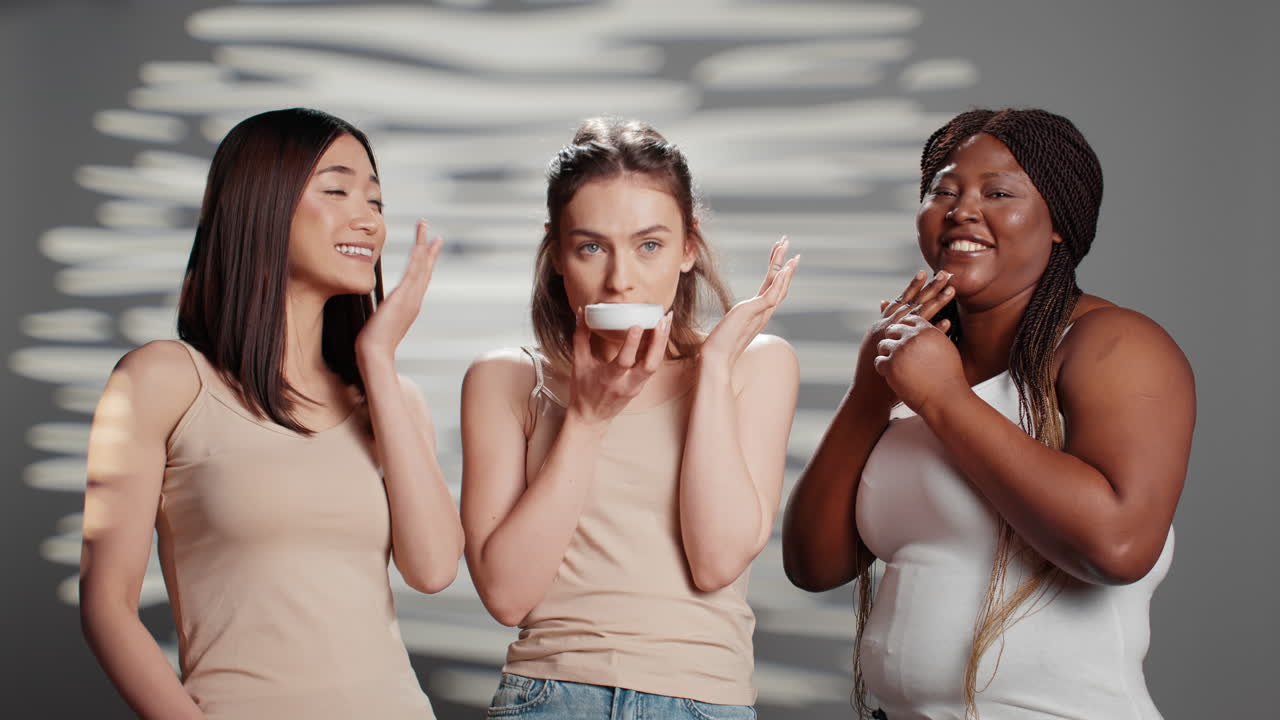 Diverse Group of Women Applying Skincare Products