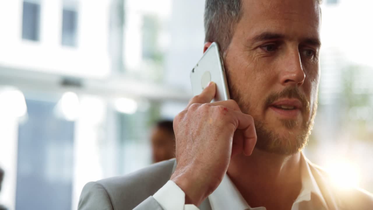 Businessman talking on mobile phone