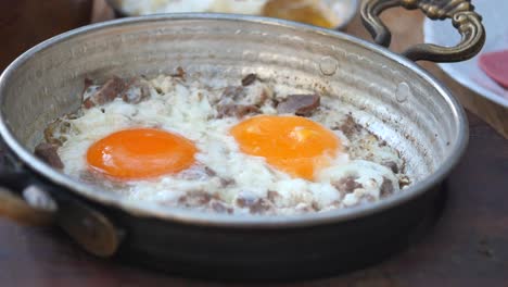 turkish breakfast: fried eggs with meat