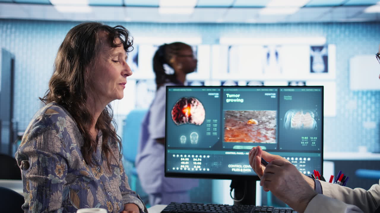 Vertical Video Male old healthcare provider conducts a concussion test in a medical clinic