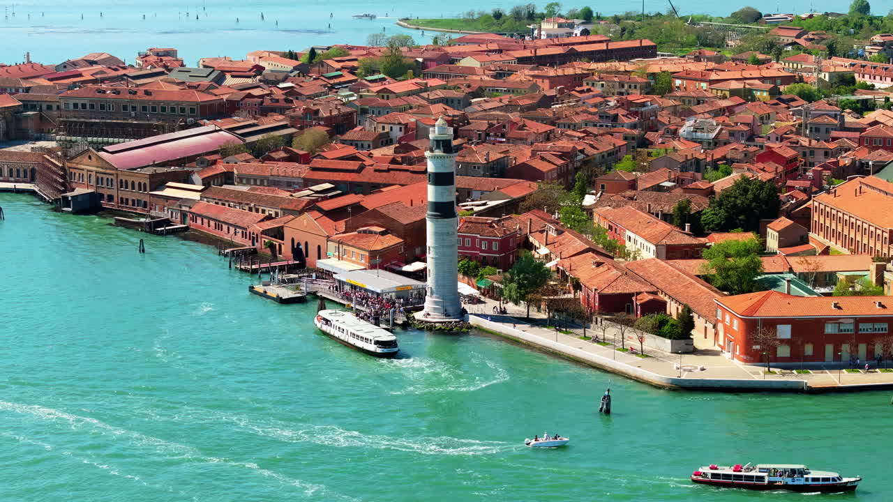 Aerial drone view of boats moving near Murano, Venice, Italy
