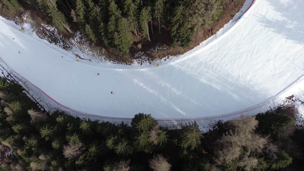 This is a large ski area that prepares Cortina 2026 in Italy. The locations are captured with a drone that shows the beauty of winter sports that combine blue sky, white snow and vacations