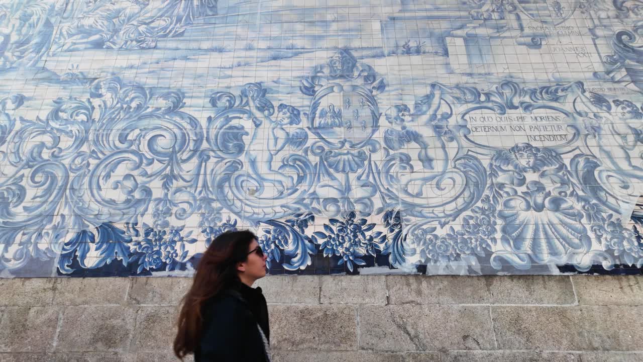 Porto street scene with girl and blue mosaic artwork