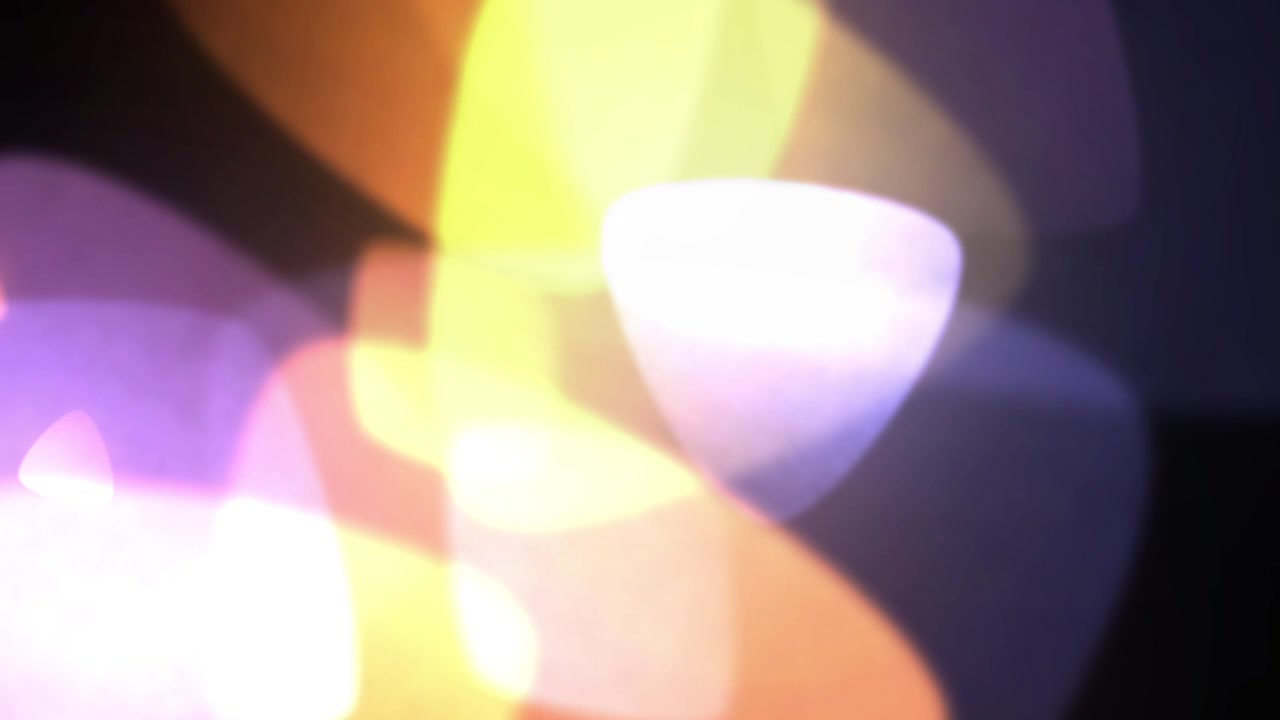 Abstract Light Leaks and Bokeh Overlay on Black Background