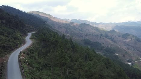 Flying-over-mountain-range-forest-in-Vietnam