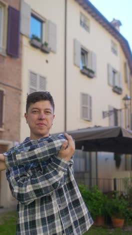 man stretching outdoors in city