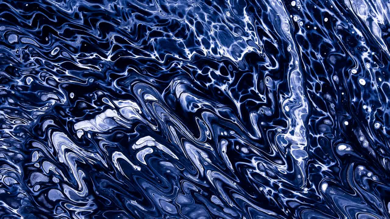 An acrylic pouring artwork which is animated to flow
