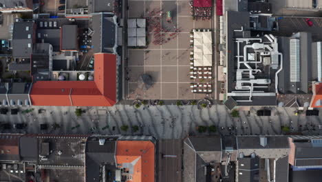 Top-down-view-of-Torvegade-in-Esbjerg,-one-of-Denmark's-longest-pedestrian-avenue.-Overhead-view-over-the-famous-Torvet-square-in-Esbjerg,-Denmark-with-the-statue-of-Christian-IX