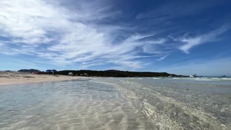 First-person-view-walking-along-Lotu-beach-and-shore-in-summer-season,-Corsica-island-in-France