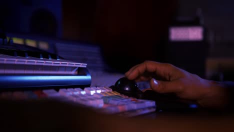 sound engineer working at a mixing desk