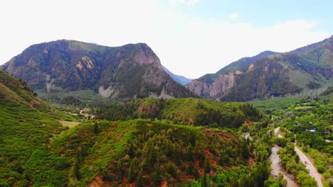 beautiful colorful green yellow and orange alpine woodland scenery in colorado usa countryside