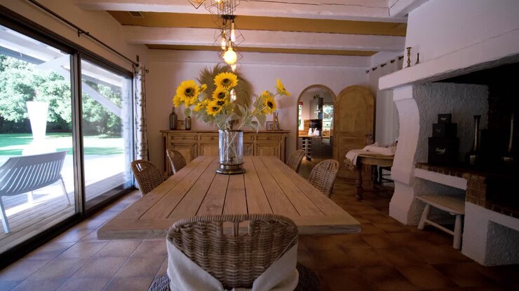 Slow motion establishing shot of a modern kitchen within a villa in France
