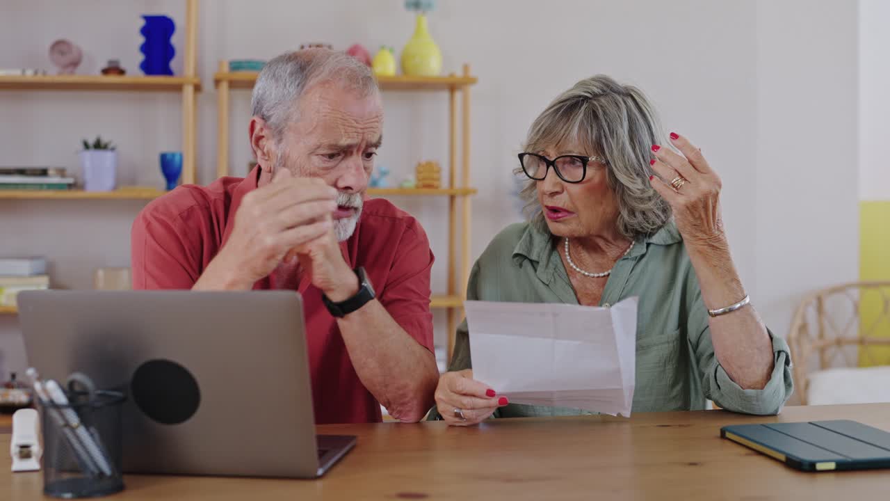 Worried Senior Couple Facing Financial Problems