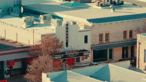 historic palace theatre in downtown georgetown, texas aerial sweep with 4k drone in fall