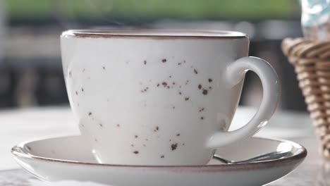 hot coffee in a white cup
