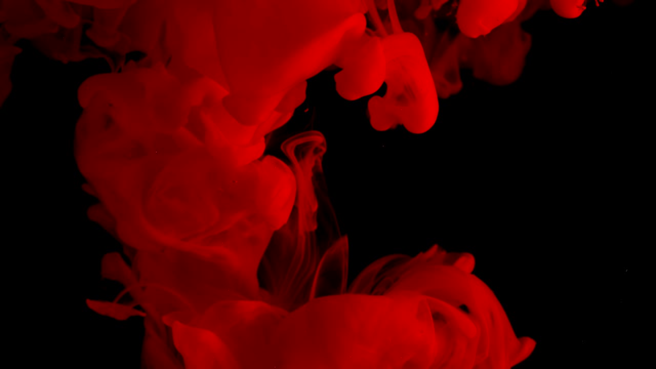 Ink in water. Colour red bloody paint reacting in water creating abstract cloud formations.Can be used as transitions,added to modern grunge projects,art backgrounds, anything with creative twist
