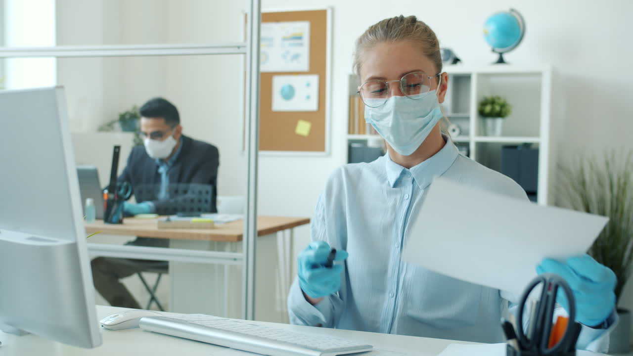 Business People Working in Office During Covid-19 Pandemic