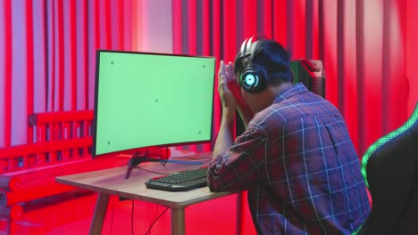 frustrated gamer in front of a computer